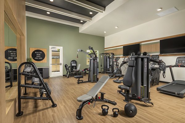 State-of-the-art fitness center with modern equipment at Delhaven Pointe Apartments