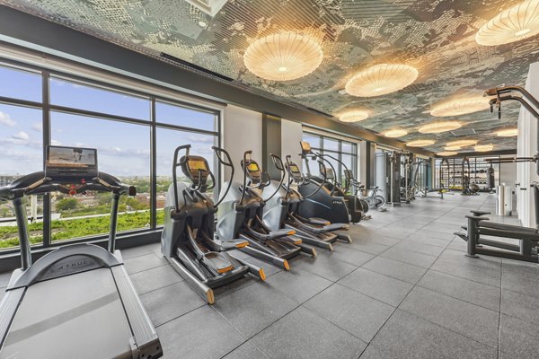 fitness center at The Iris Apartments 