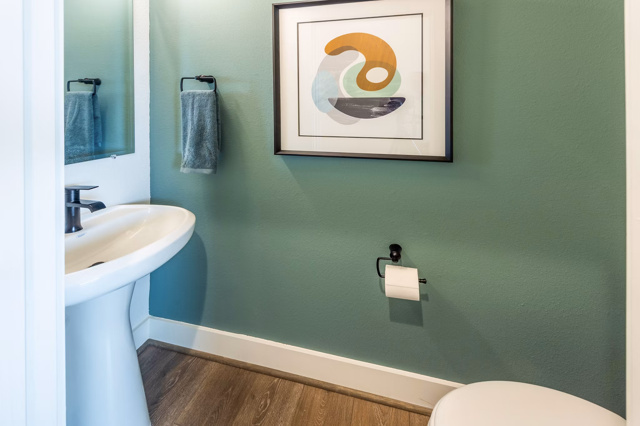 Luxurious bathroom with modern fixtures at Eden at Sunterra Apartments