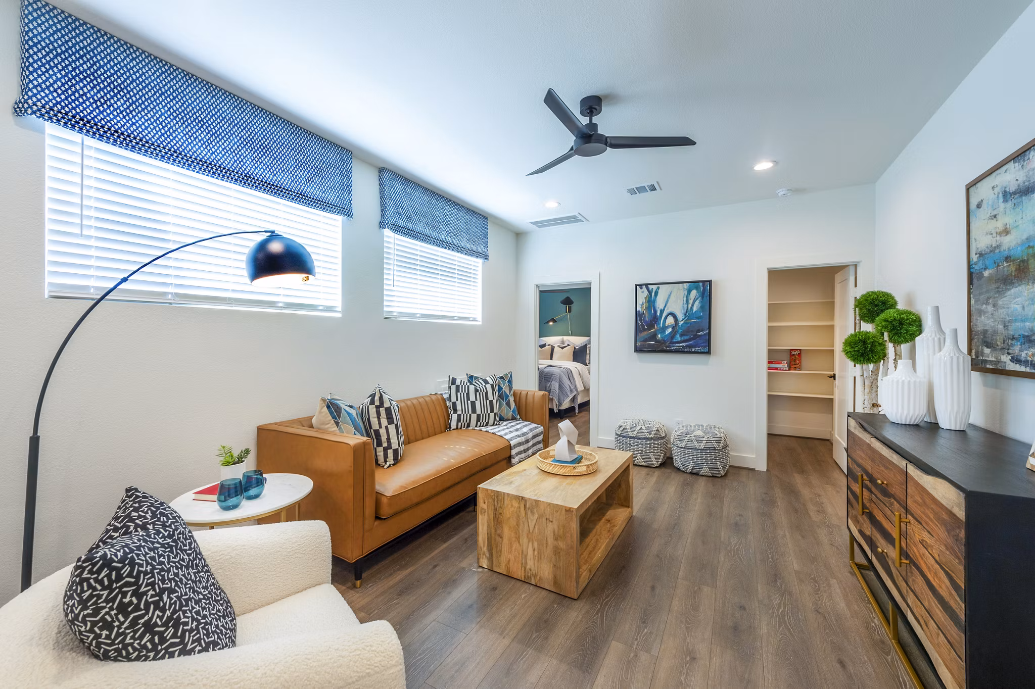 Modern living room with stylish decor at Eden at Sunterra Apartments