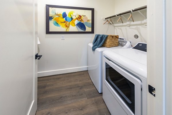 laundry room at Eden at Sunterra Apartments