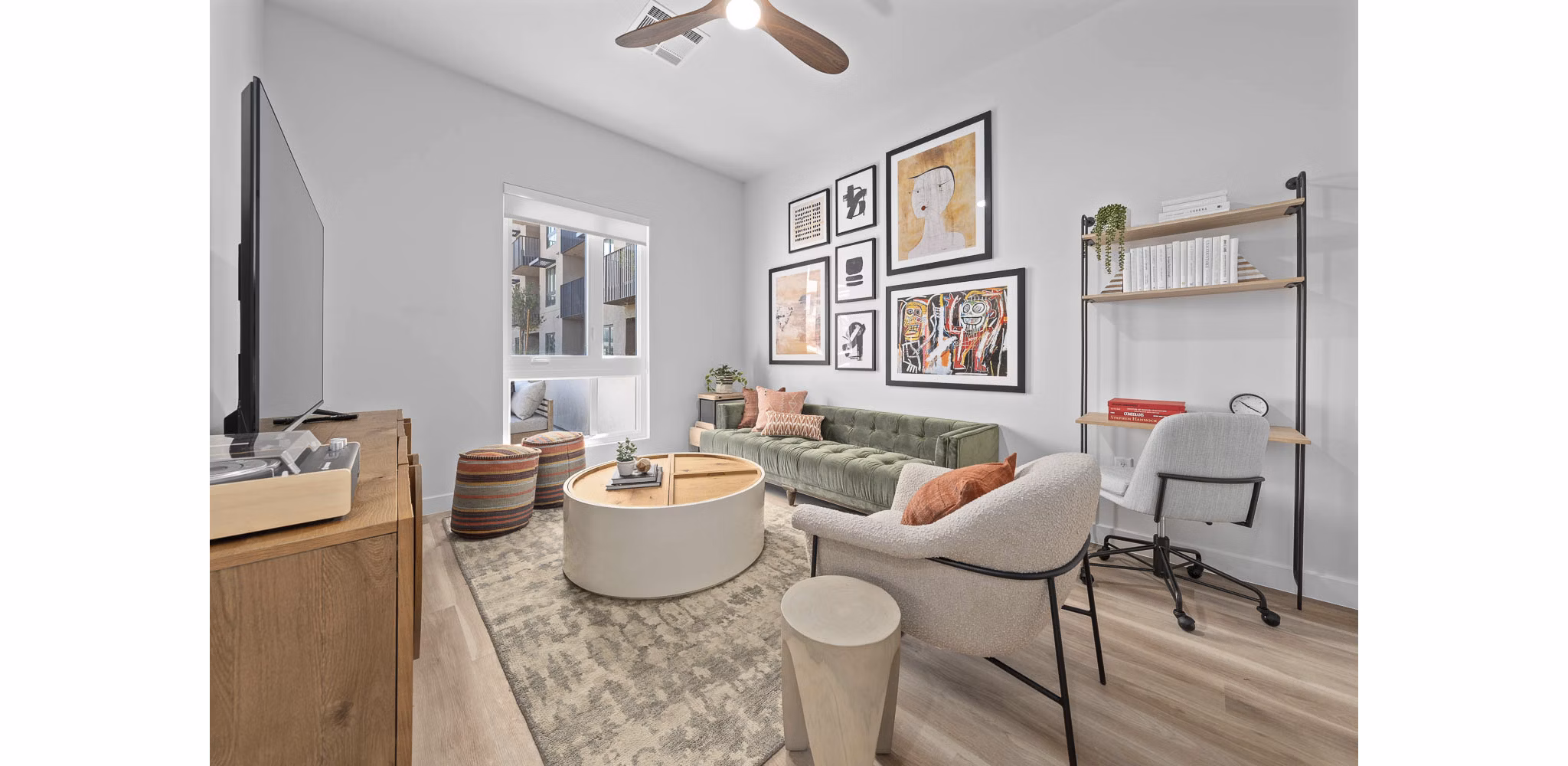 Open-concept living room with modern decor at The Monde Scottsdale Apartments