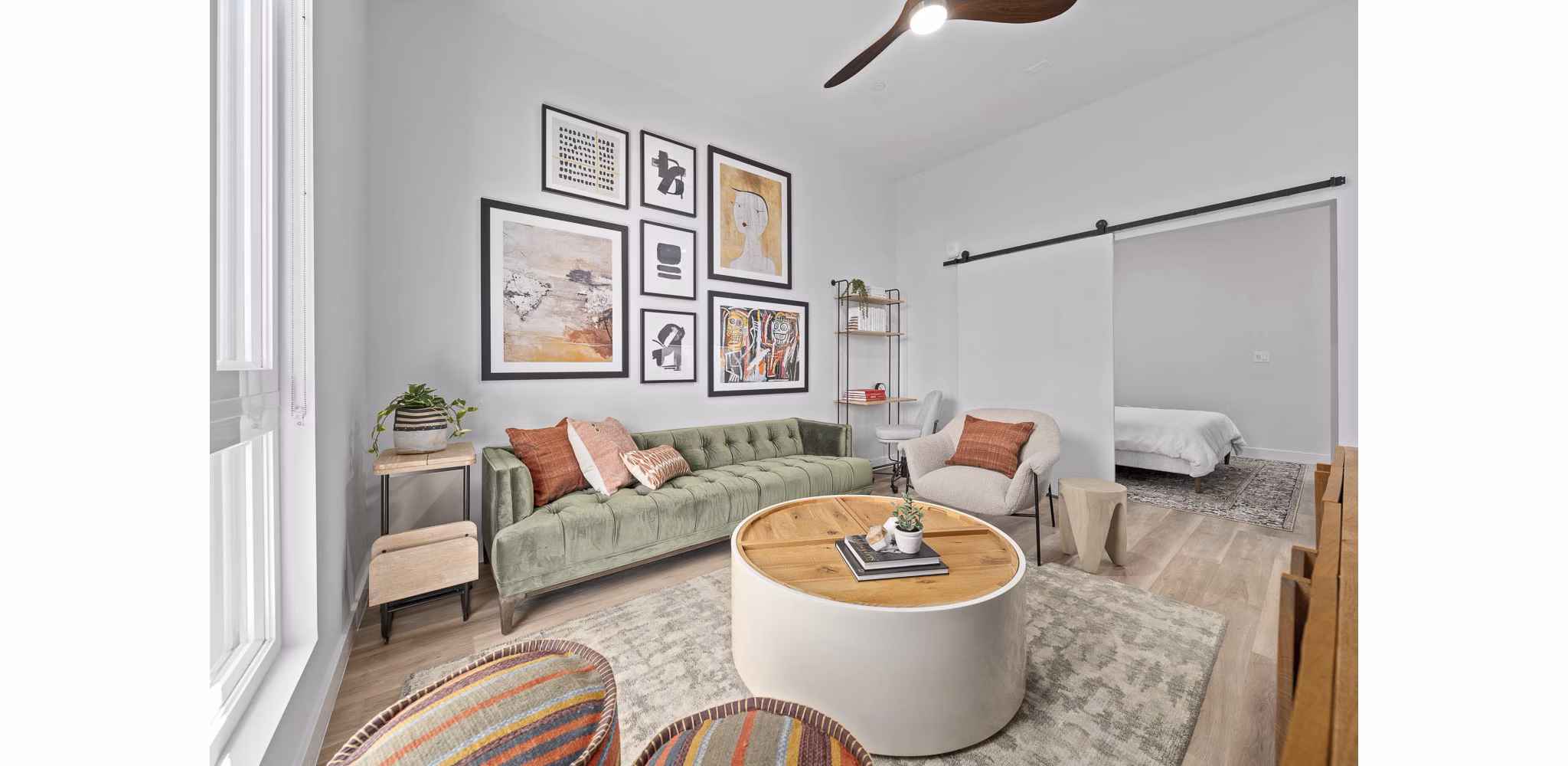 Spacious living room with modern decor and natural light at The Monde Scottsdale Apartments