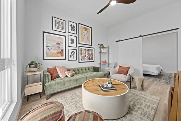 Spacious living room with modern decor and natural light at The Monde Scottsdale Apartments