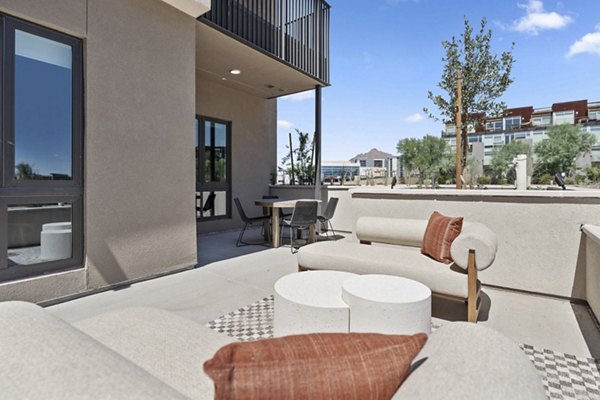 The Monde Scottsdale: Elegant patio with modern seating at luxury apartments