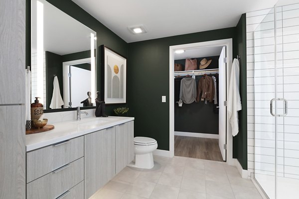 Luxurious bathroom featuring modern fixtures and elegant design in Vasara Apartments, managed by Greystar