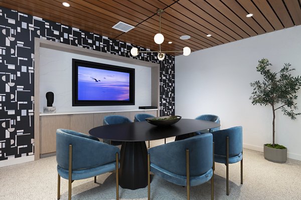 Dining room with elegant lighting and modern decor at Vasara Apartments