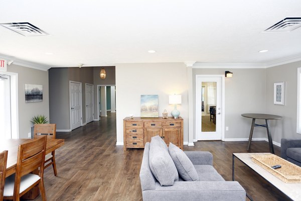 Clubhouse featuring modern decor and seating at The M Club Apartments