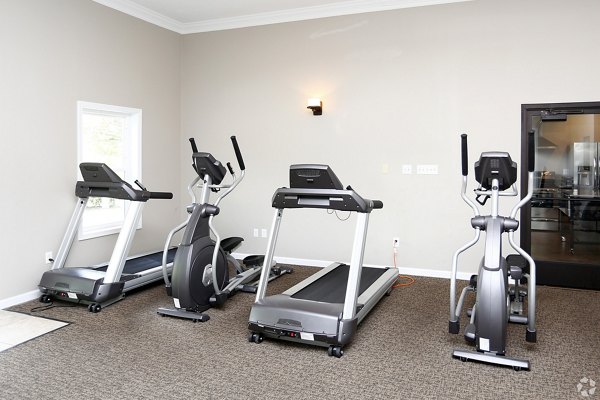 fitness center at The M Club Apartments