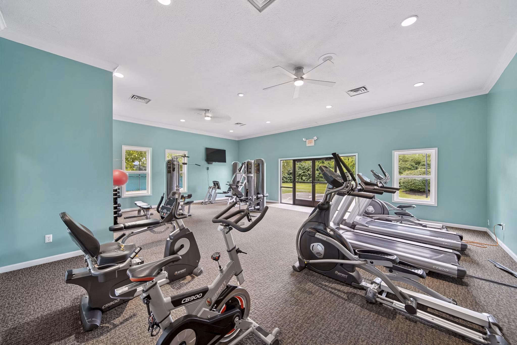 fitness center at The M Club Apartments Apartments