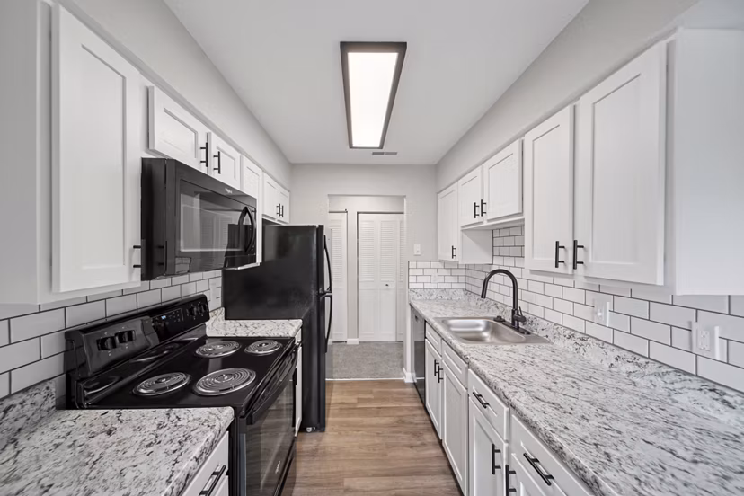 kitchen at The M Club Apartments Apartments