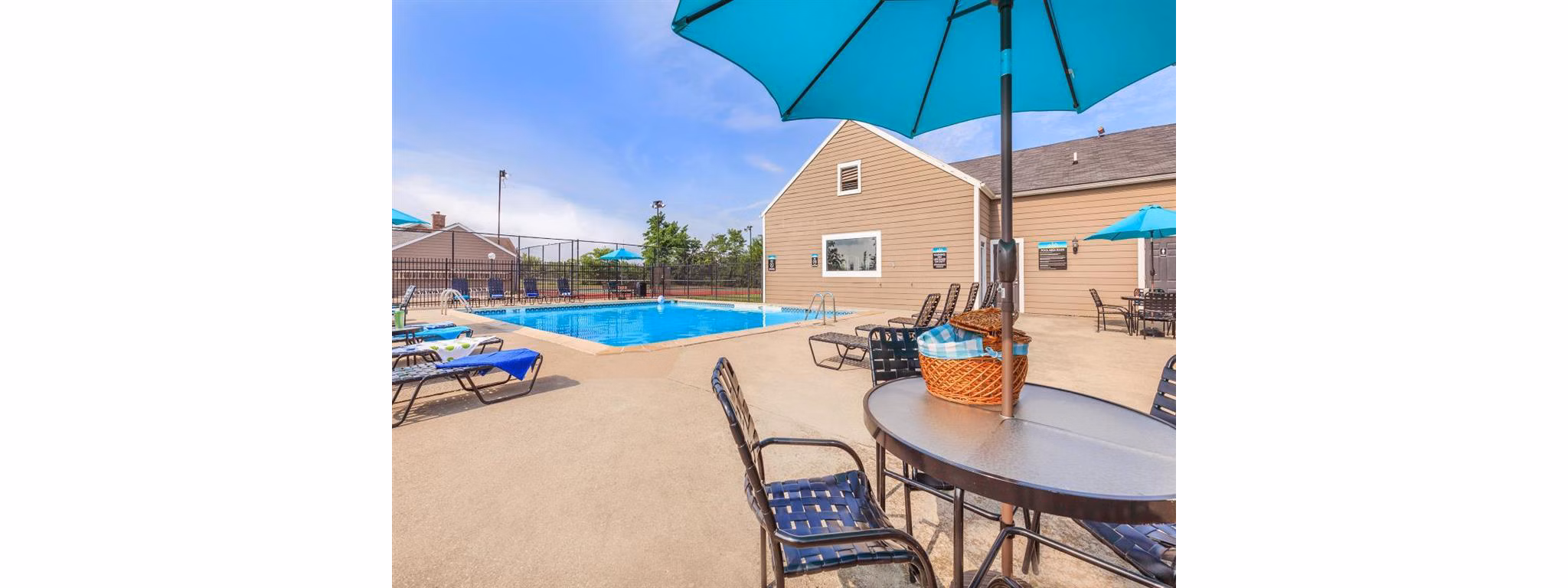 Luxurious pool area at The M Club Apartments offering relaxation and style near local amenities