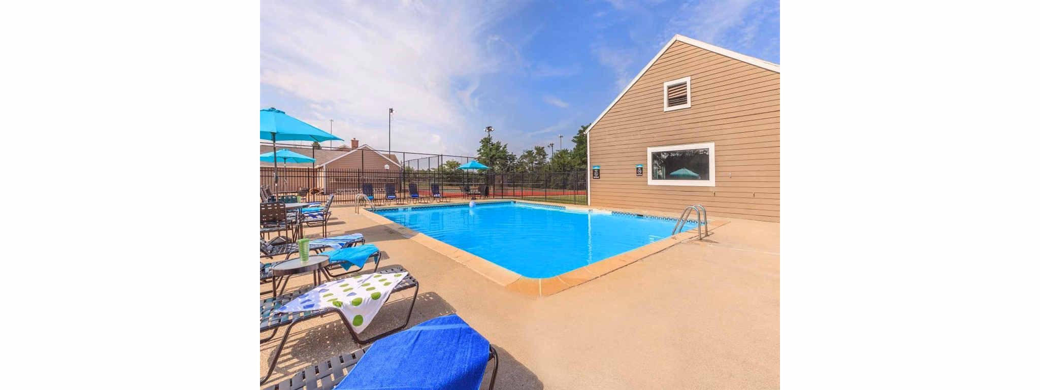 Poolside relaxation at The M Club Apartments featuring luxury amenities and stylish design