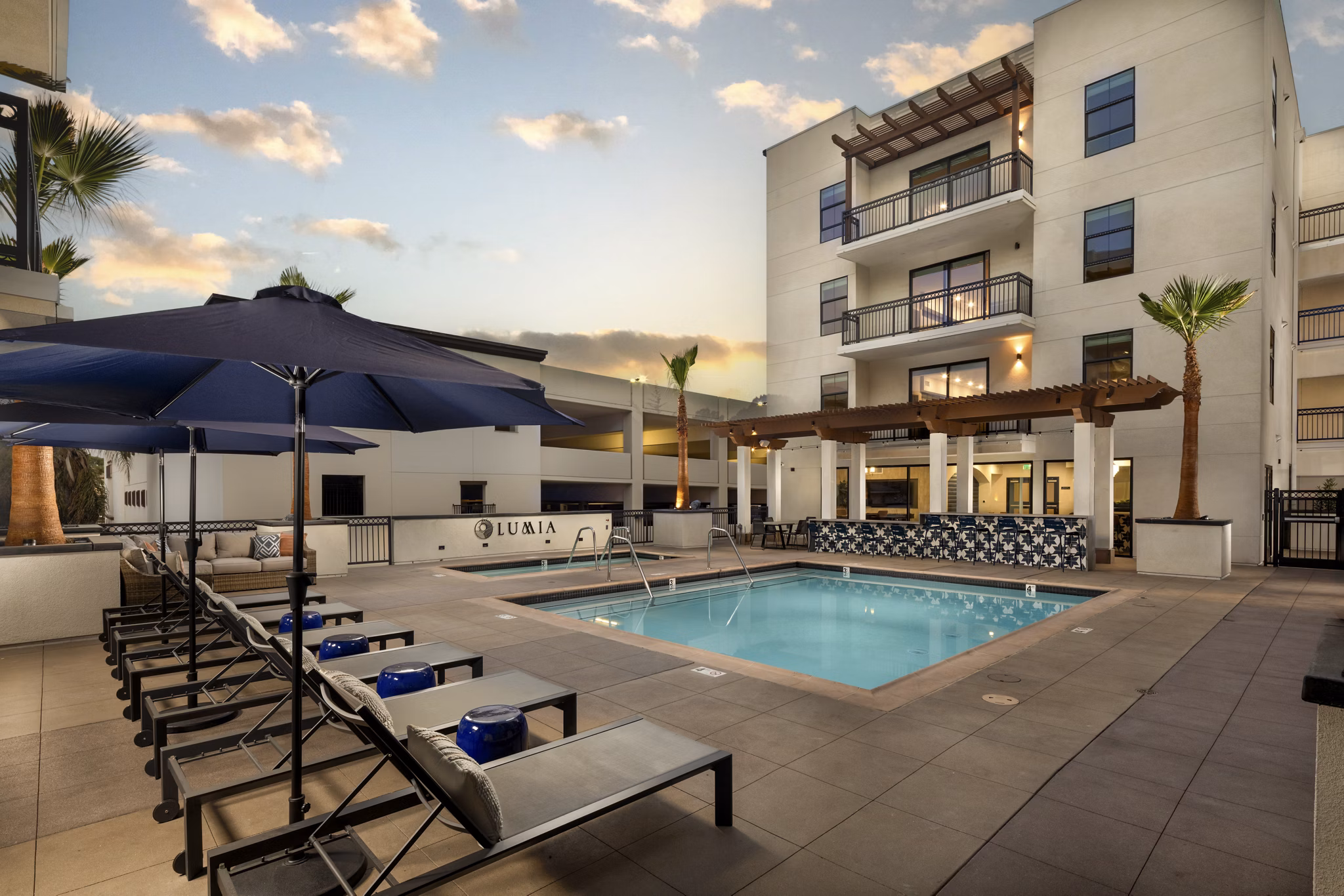Rooftop pool at Lumia Apartments offering luxury leisure with city views
