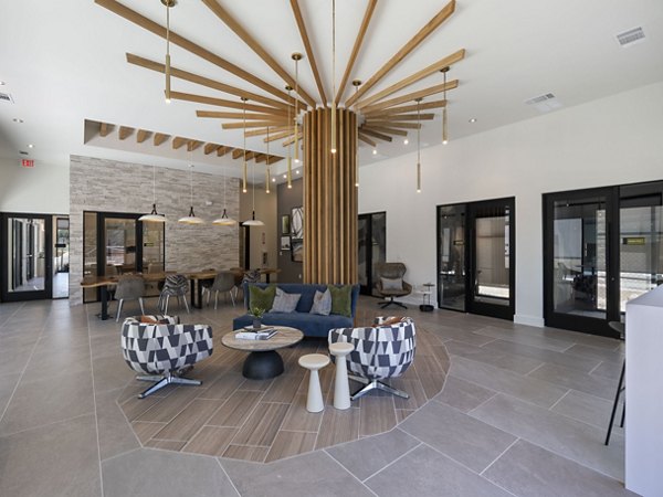 Lobby featuring modern decor and seating in The Evergrove at Crystal Village Apartments