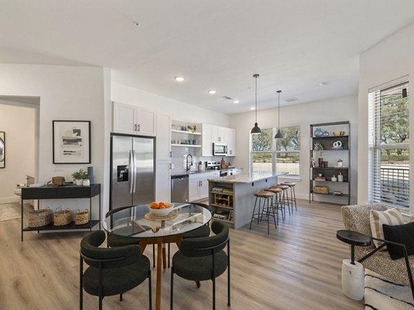 Modern living room with stylish decor in The Evergrove at Crystal Village Apartments