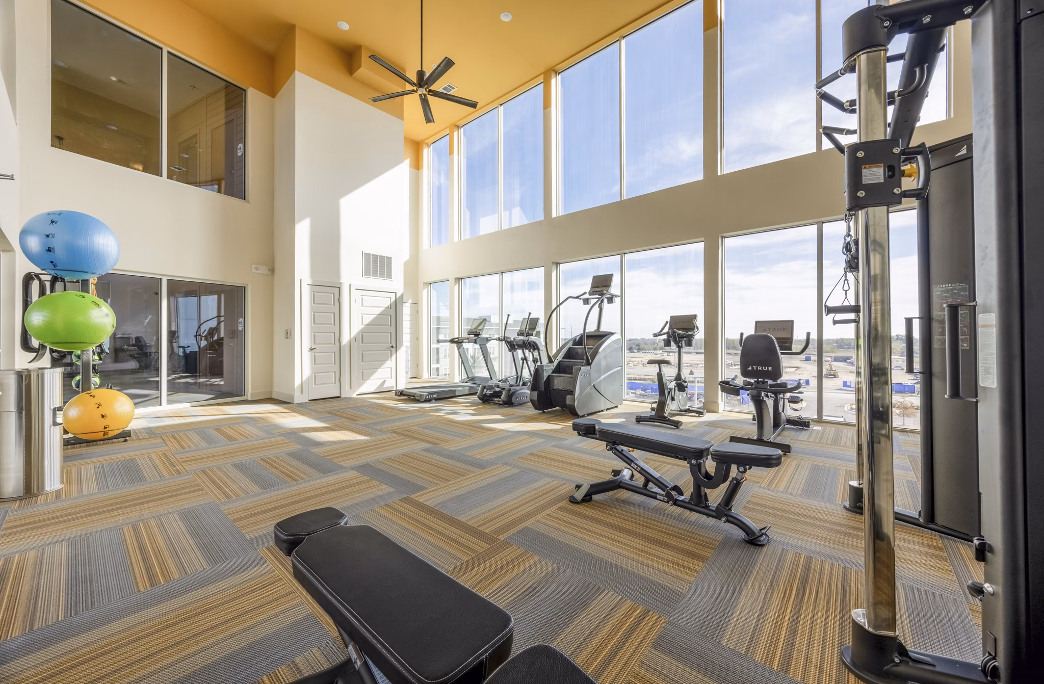 fitness center at Parks @ Hunter`s Creek Apartments