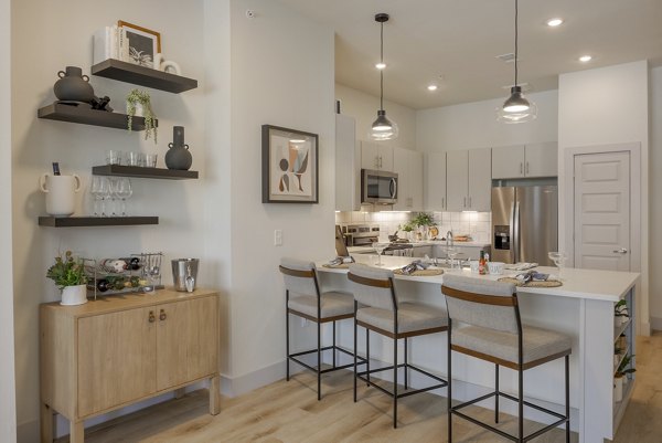 kitchen and dining area at The Janis Apartments
