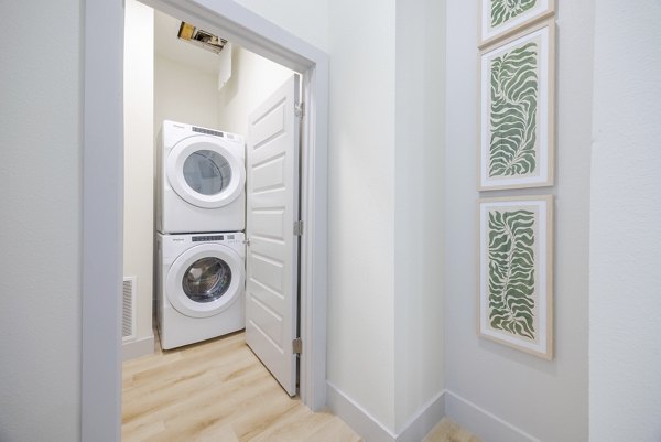 laundry room at The Janis Apartments