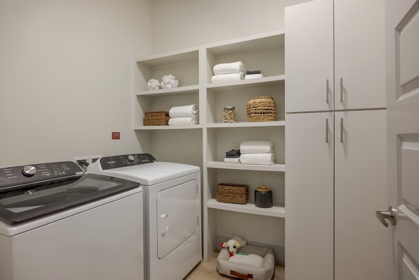 laundry room at The Janis Apartments