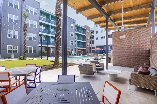 pool patio area at The Janis Apartments