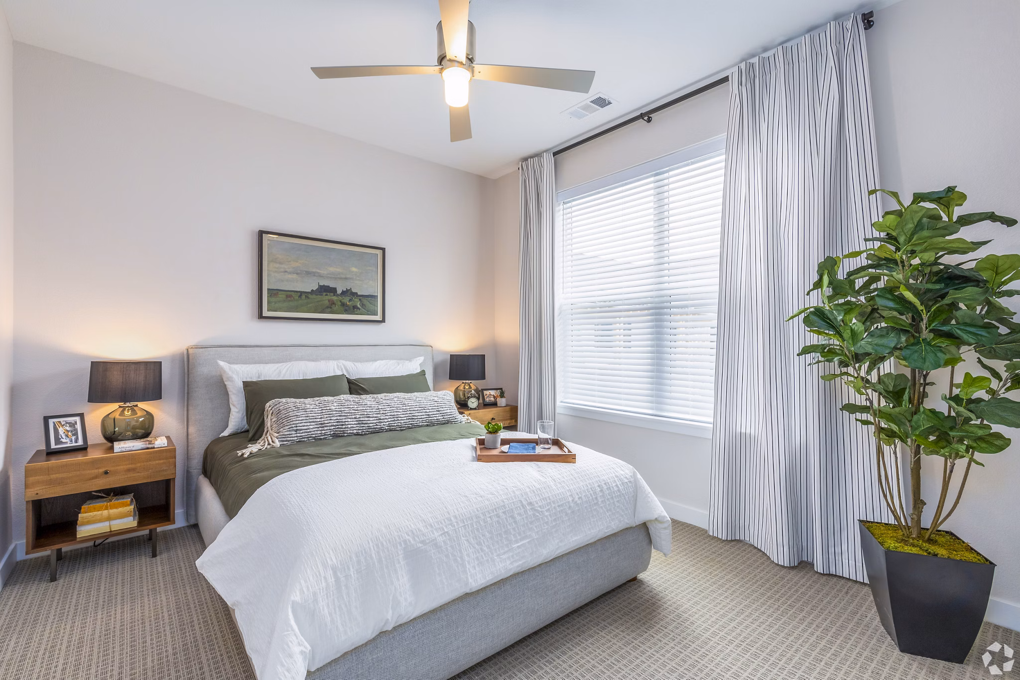 Cozy bedroom with stylish decor in Park 40 Apartments, featuring luxury furnishings and modern design elements