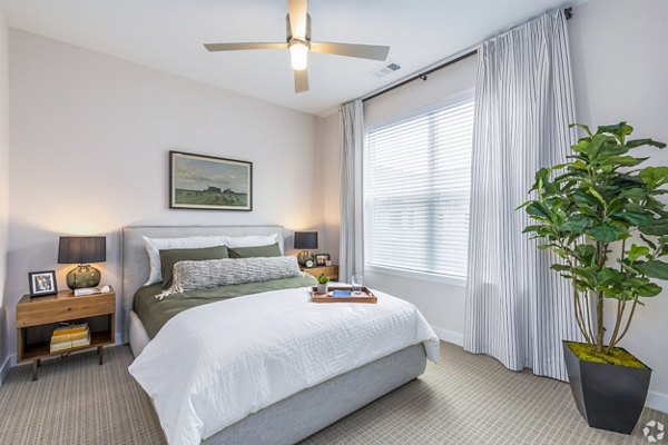 Cozy bedroom with stylish decor in Park 40 Apartments, featuring luxury furnishings and modern design elements