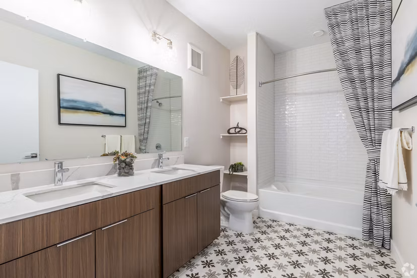 Modern bathroom featuring sleek fixtures and marble countertops in Park 40 Apartments