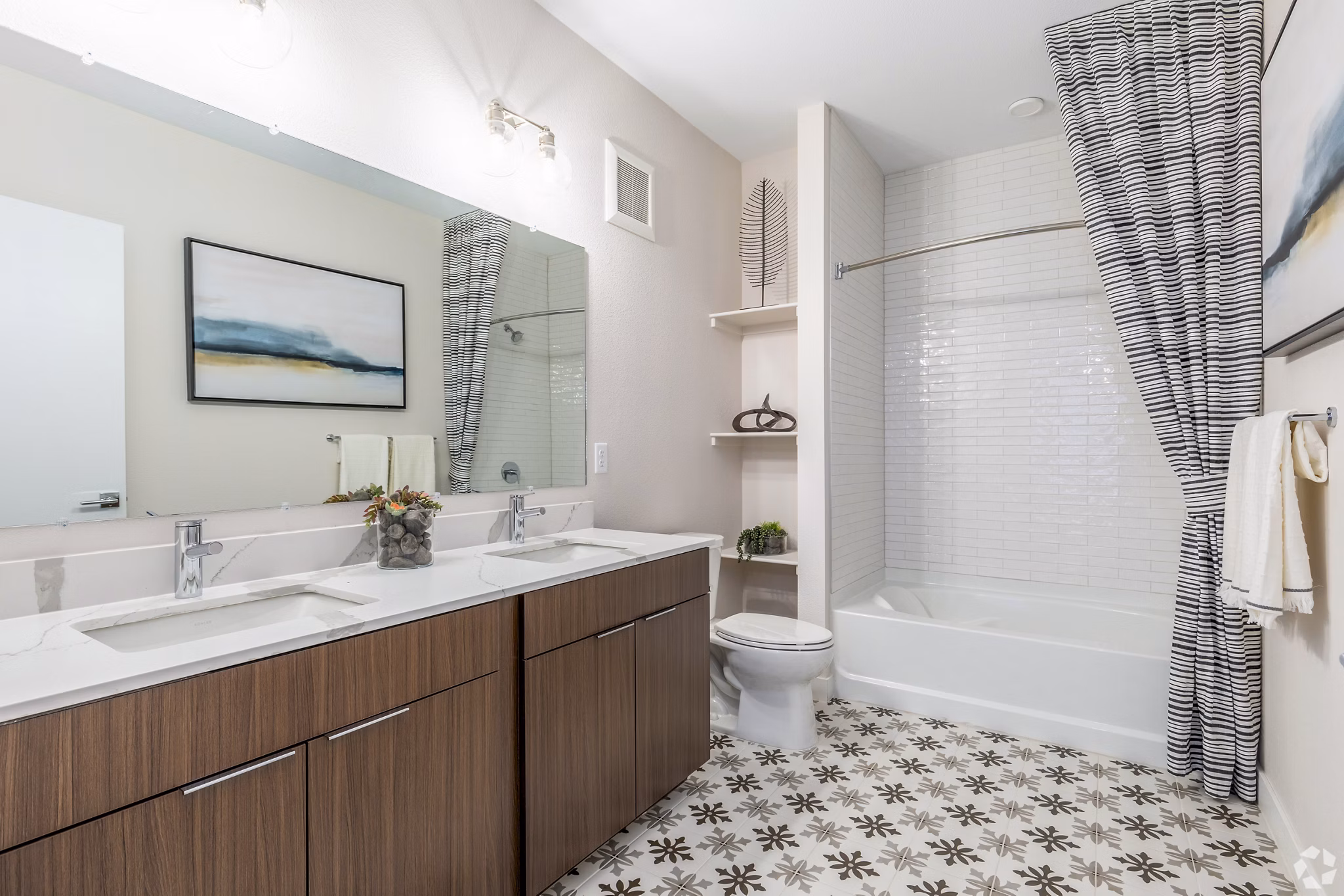 Modern bathroom featuring sleek fixtures and marble countertops in Park 40 Apartments