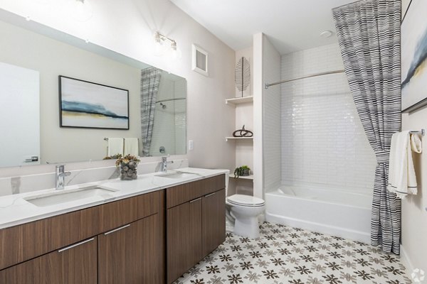 Modern bathroom featuring sleek fixtures and marble countertops in Park 40 Apartments