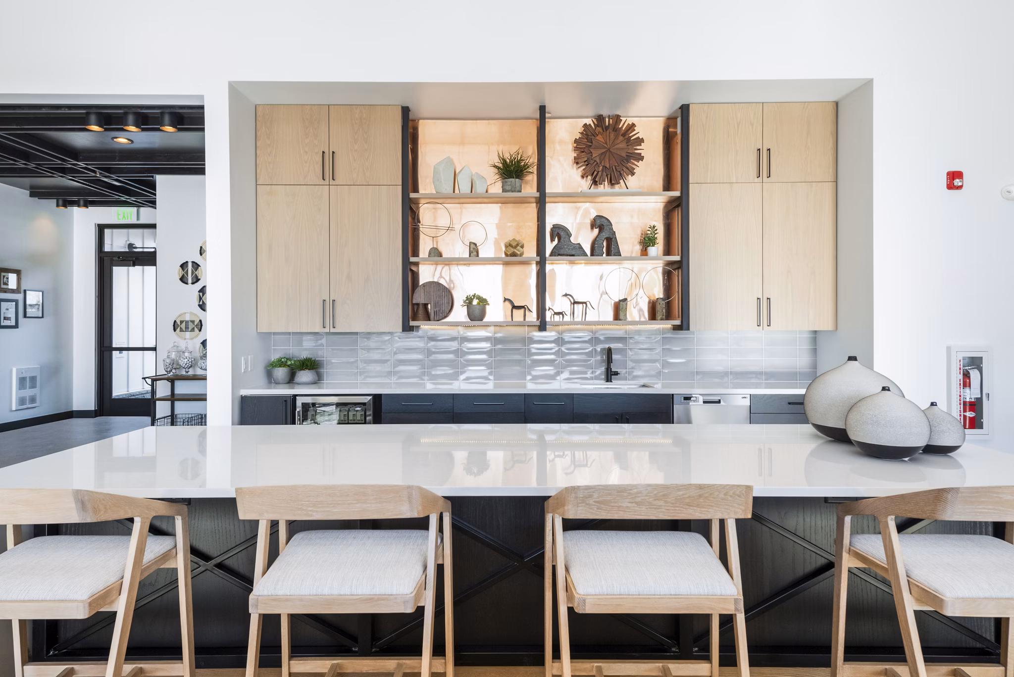 Modern clubhouse with spacious seating and fireplace at Park 40 Apartments, a luxury Greystar community