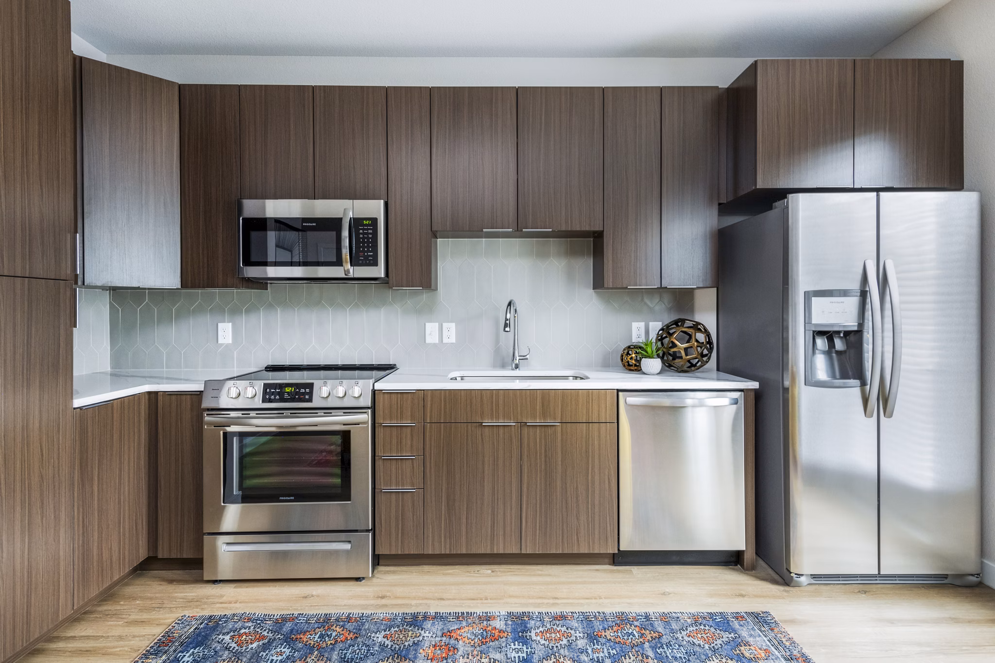 Modern kitchen with stainless steel appliances at Park 40 Apartments