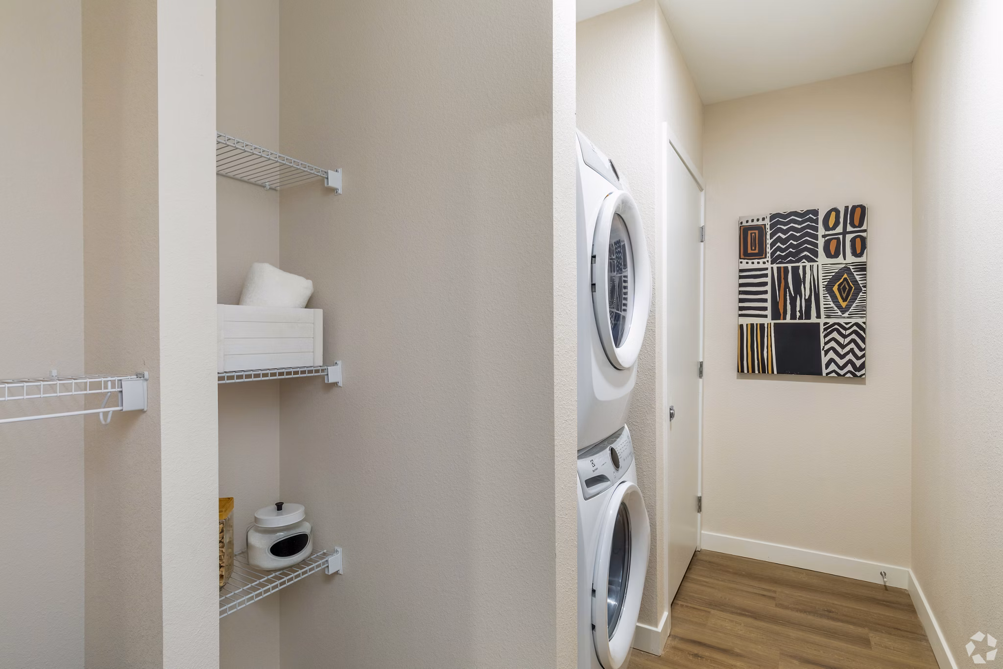 Laundry room with high-efficiency washers and dryers at Park 40 Apartments, a Greystar luxury community