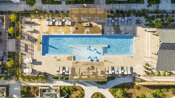 Relaxing outdoor pool area at Park 40 Apartments with modern design and comfortable seating options