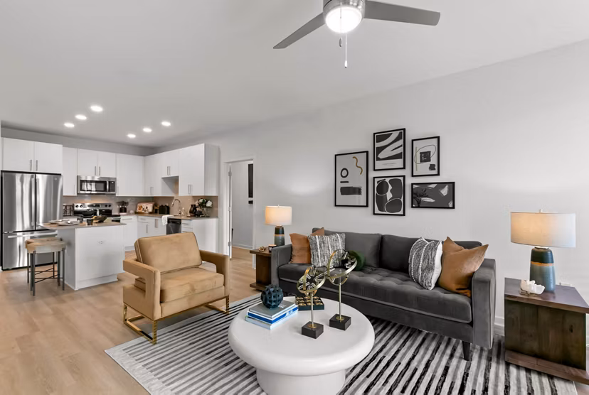 Spacious living room with modern decor at Marlowe Ridgeview Apartments, showcasing luxury design for comfortable urban living