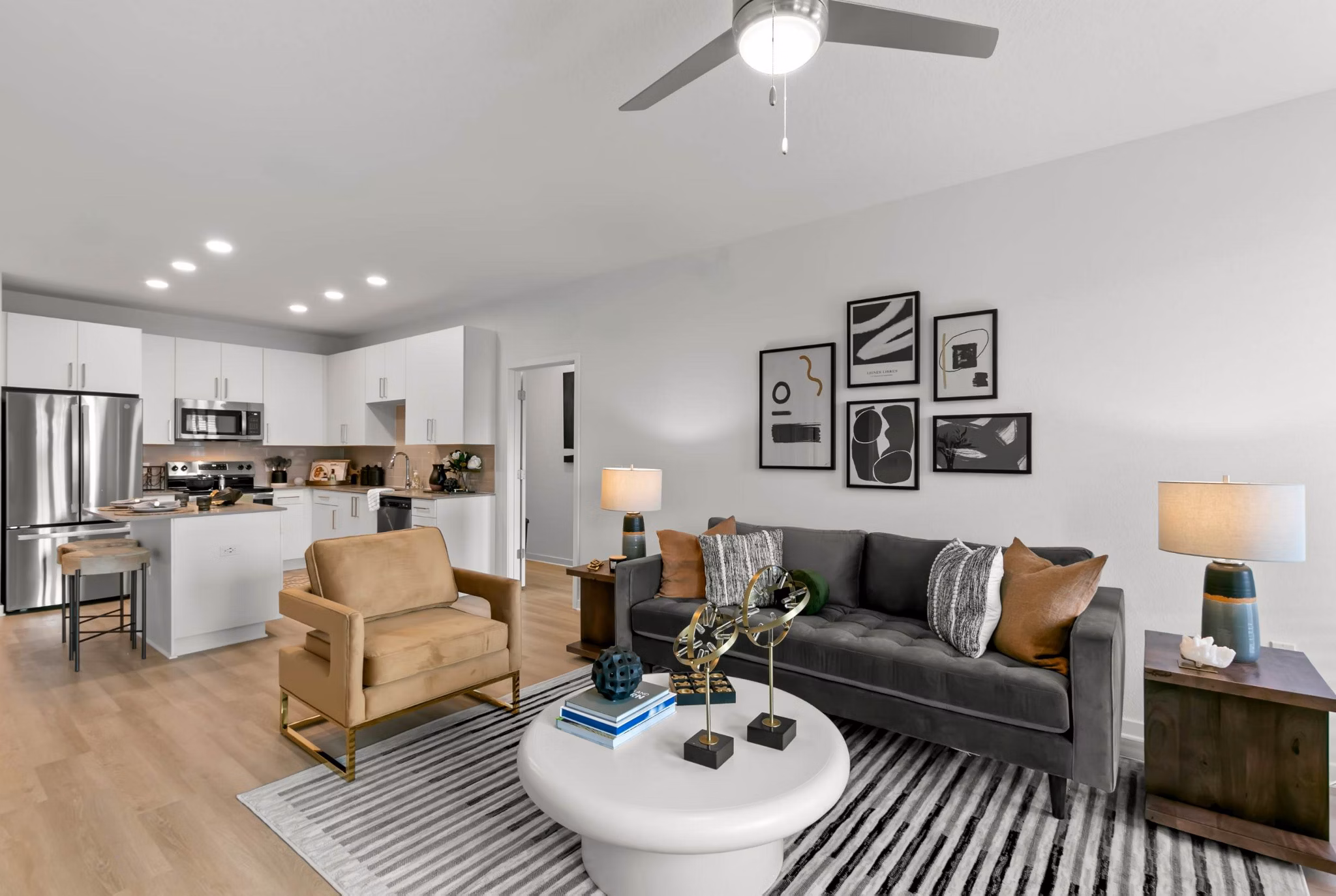 Spacious living room with modern decor at Marlowe Ridgeview Apartments, showcasing luxury design for comfortable urban living