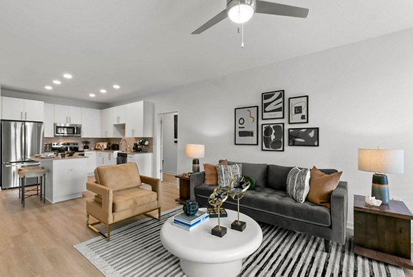 Spacious living room with modern decor at Marlowe Ridgeview Apartments, showcasing luxury design for comfortable urban living