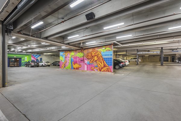 Secure parking garage at The Gibson Apartments with convenient access and ample space for residents in luxury community