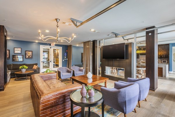 Clubhouse interior featuring modern design and luxury seating at The Gibson Apartments
