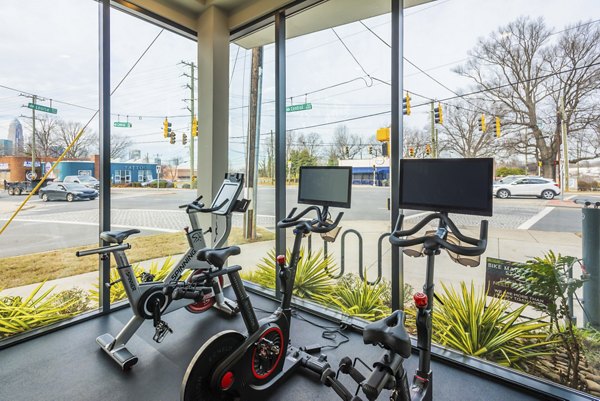 Modern fitness center with state-of-the-art equipment at The Gibson Apartments