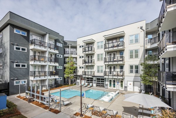 Rooftop pool with stunning skyline views at The Gibson Apartments