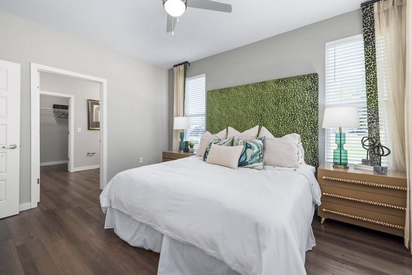 Atlantic Springs Apartments: Cozy bedroom with modern decor and natural light