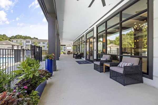 Cozy patio with modern furniture at Atlantic Springs Apartments