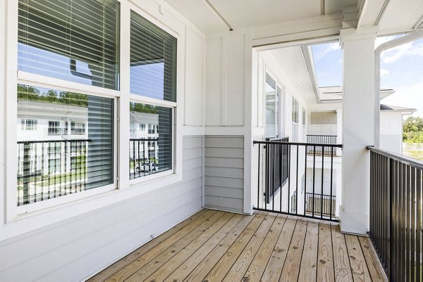 Patio featuring modern furniture at Atlantic Springs Apartments