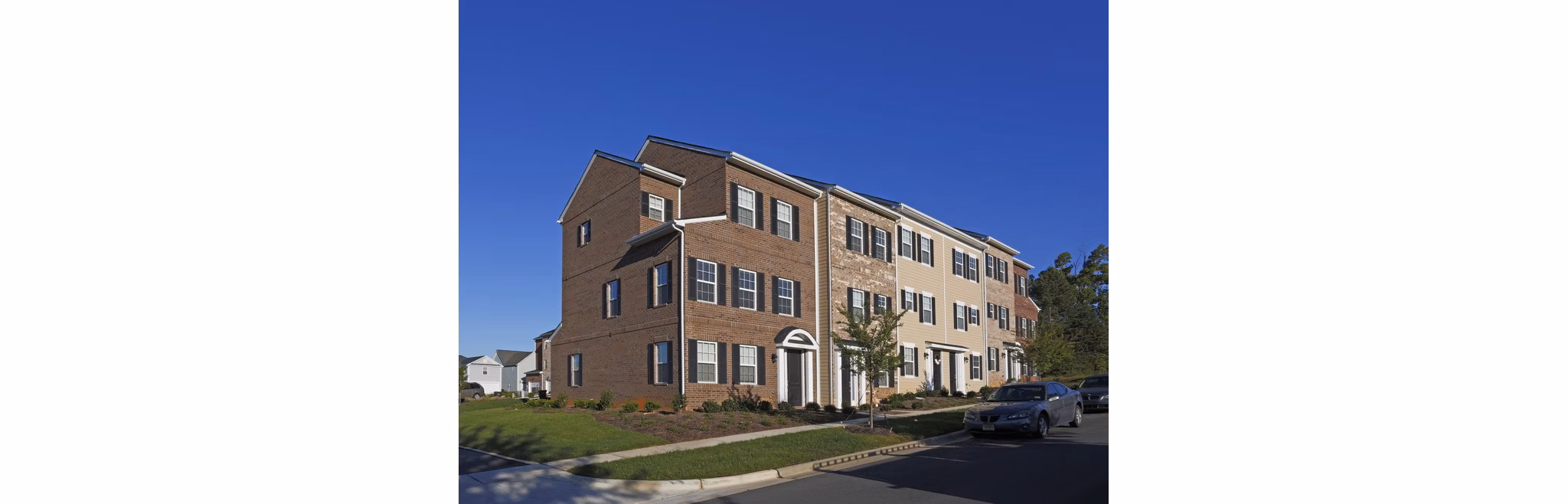 Charleston Row Townhomes: Elegant brick facade luxury townhomes in Charleston