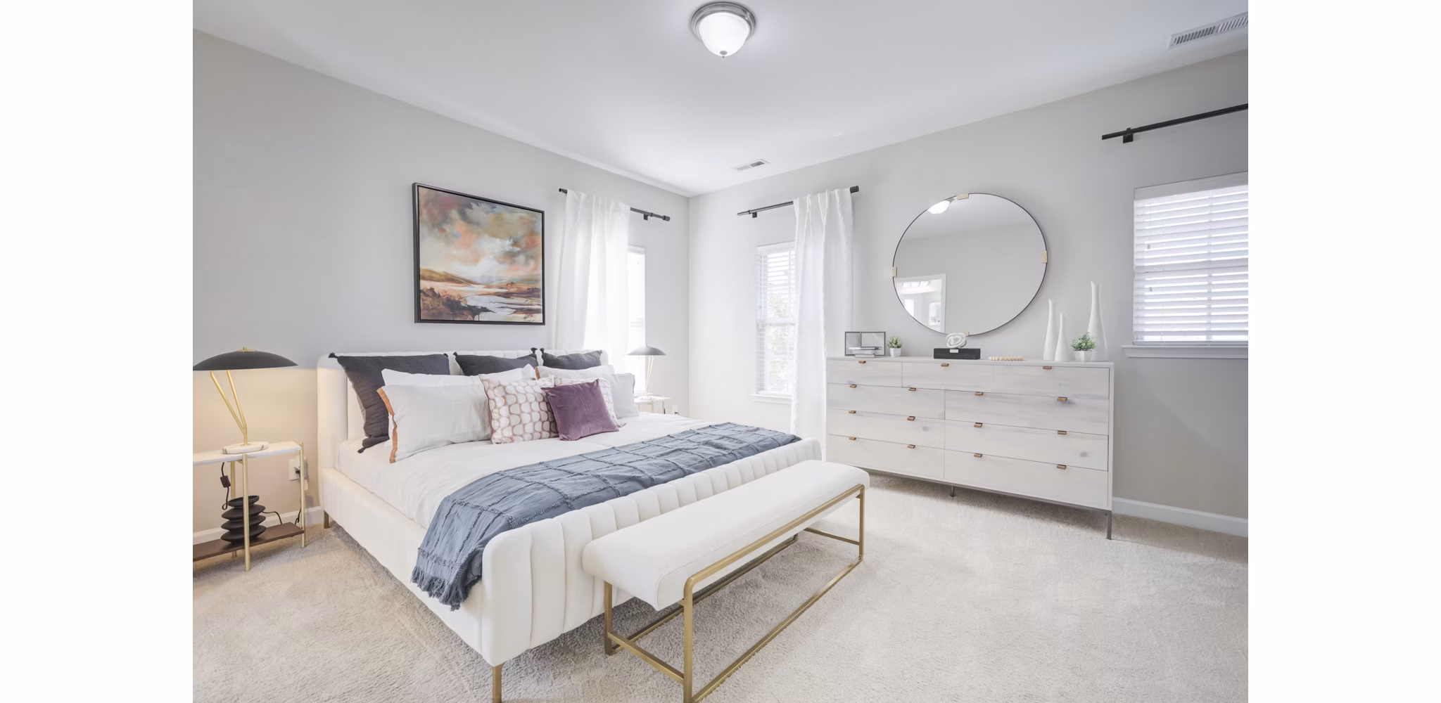 Bedroom featuring elegant design elements in Charleston Row Townhomes