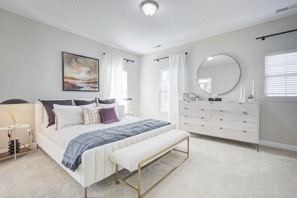 Bedroom featuring elegant design elements in Charleston Row Townhomes