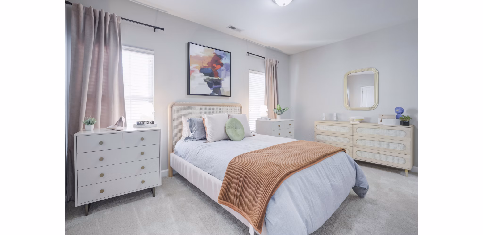 Luxurious bedroom featuring elegant furnishings at Charleston Row Townhomes