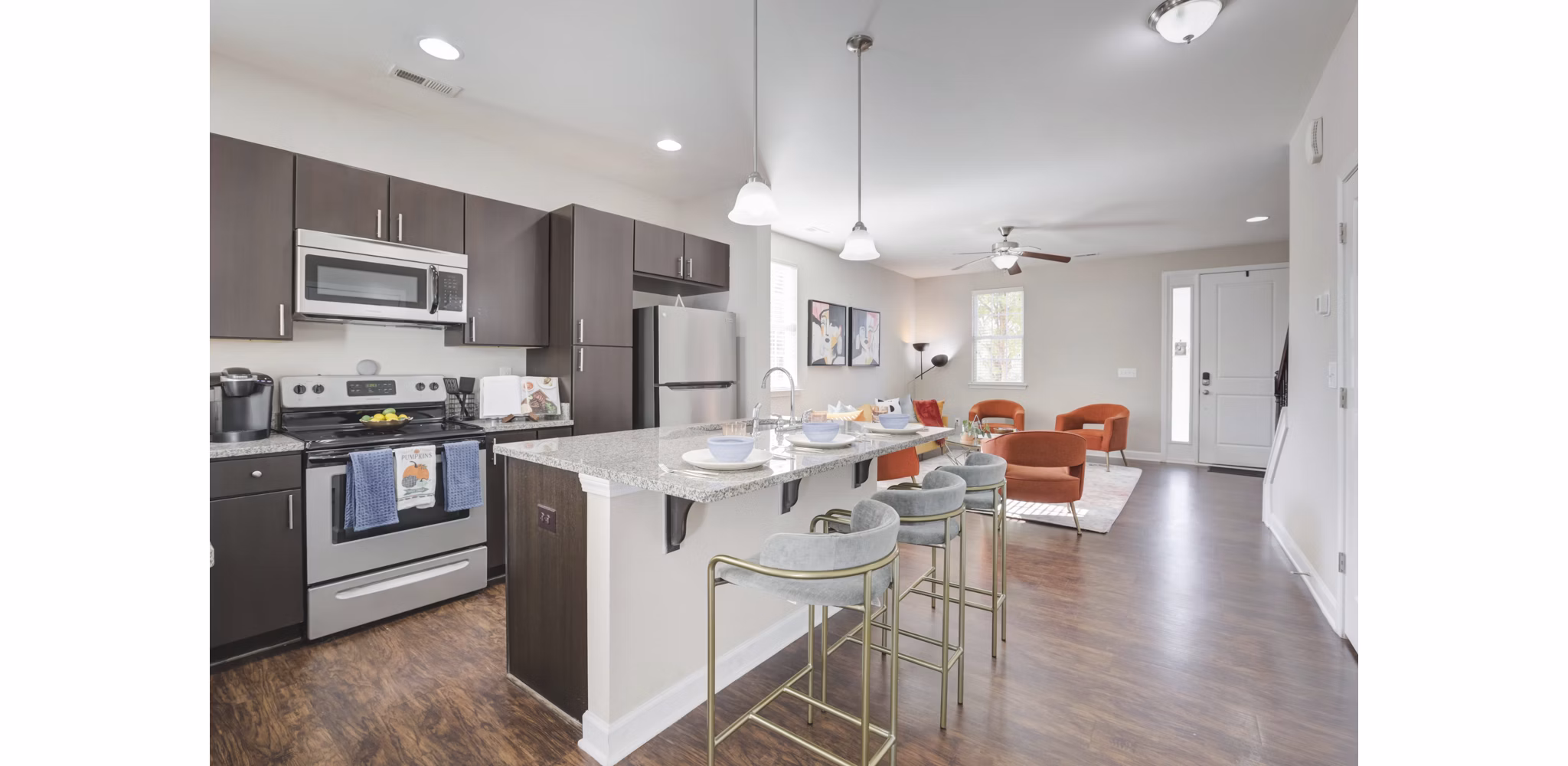 Modern kitchen with stainless steel appliances at Charleston Row Townhomes