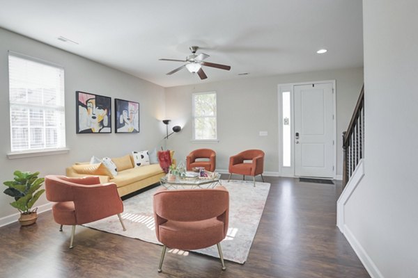 Spacious living room with modern furnishings at Charleston Row Townhomes